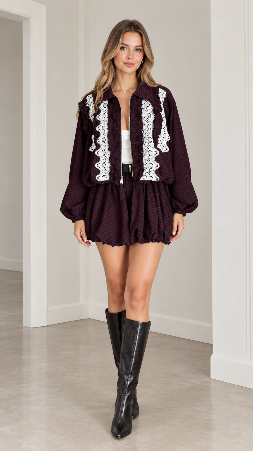 Model wearing Burgundy lace trim zip jacket and bubble shorts matching set front view