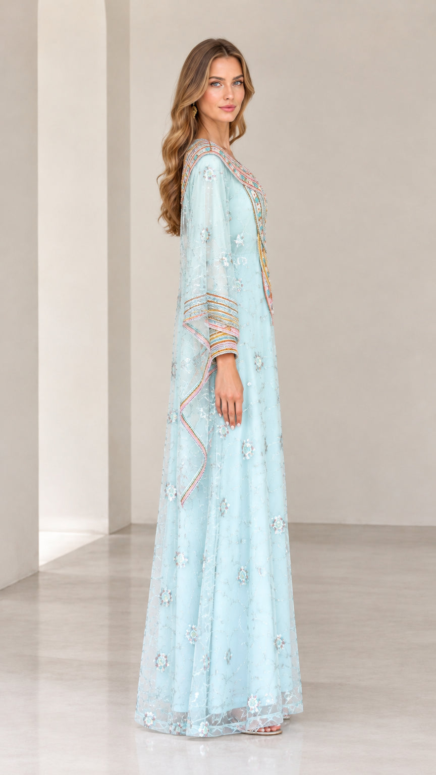 Side profile view of woman wearing Light Blue beaded kaftan maxi dress