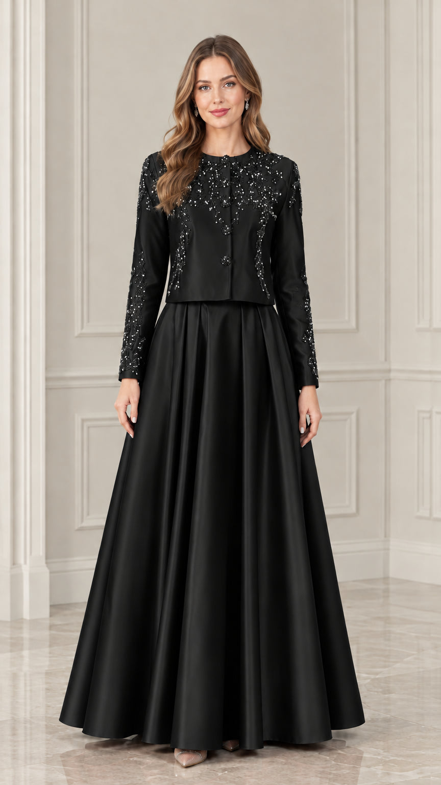 Model wearing black long sleeve beaded jacket and satin formal maxi dress set