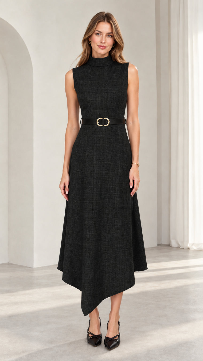 Model wearing classic black sleeveless mock neck asymmetrical midi dress