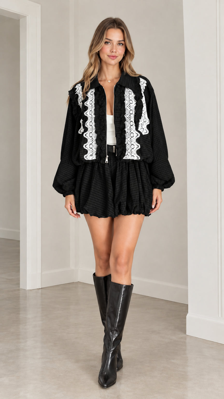 Model wearing Black lace trim zip jacket and matching bubble shorts set