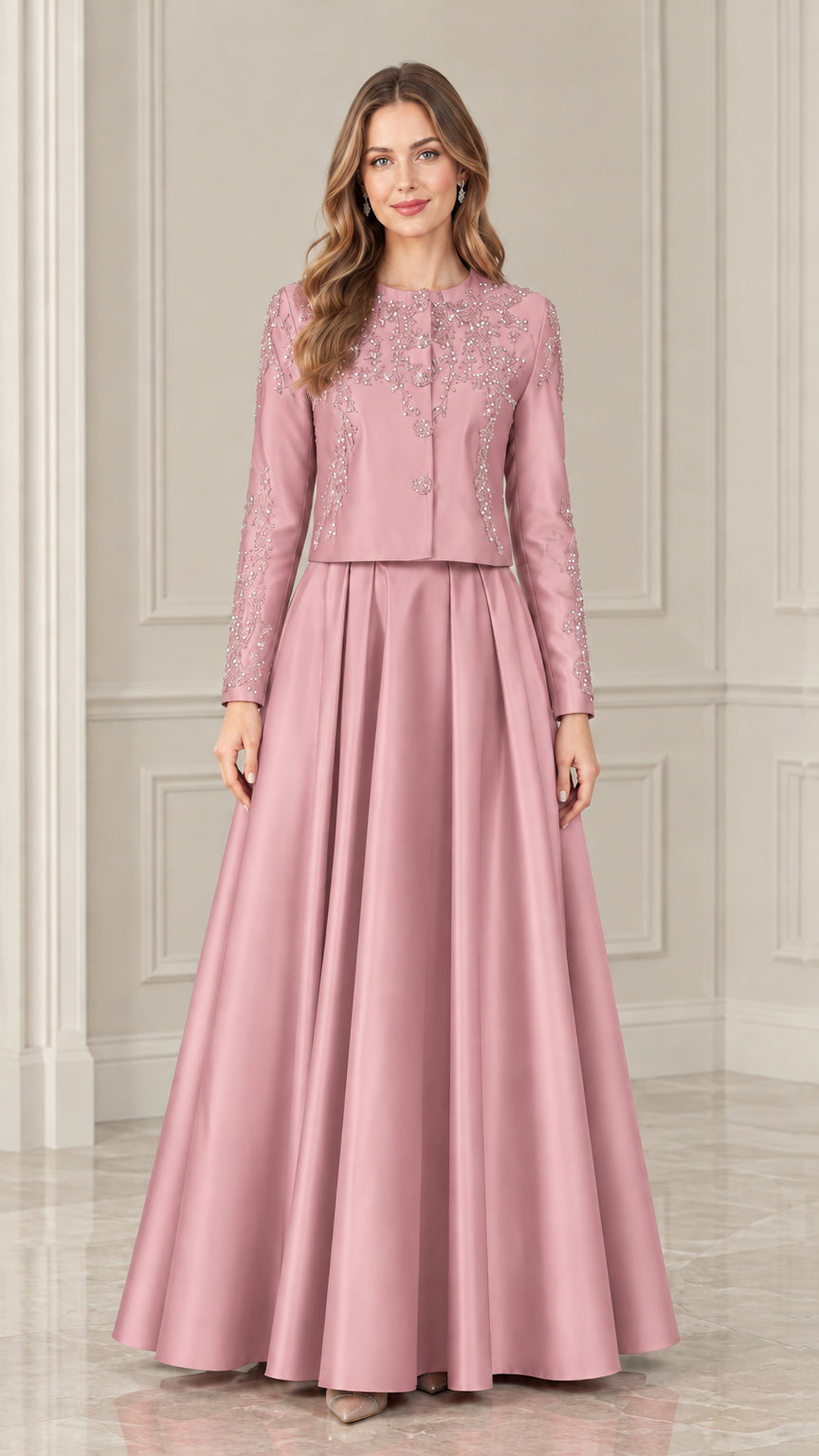 Model wearing dusty rose long sleeve beaded formal jacket and maxi skirt set