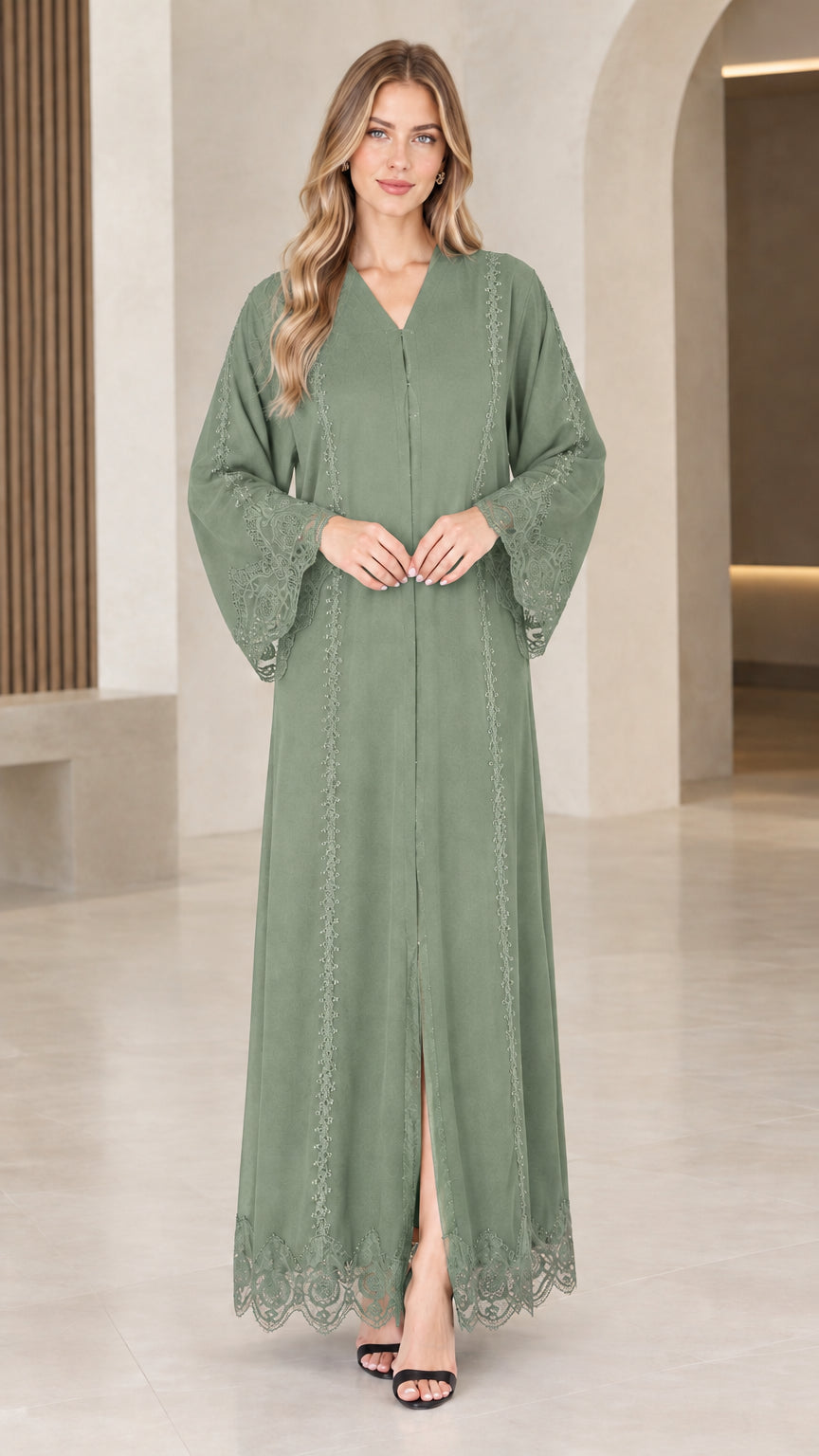Front view of woman wearing sage green lace trim maxi abaya dress