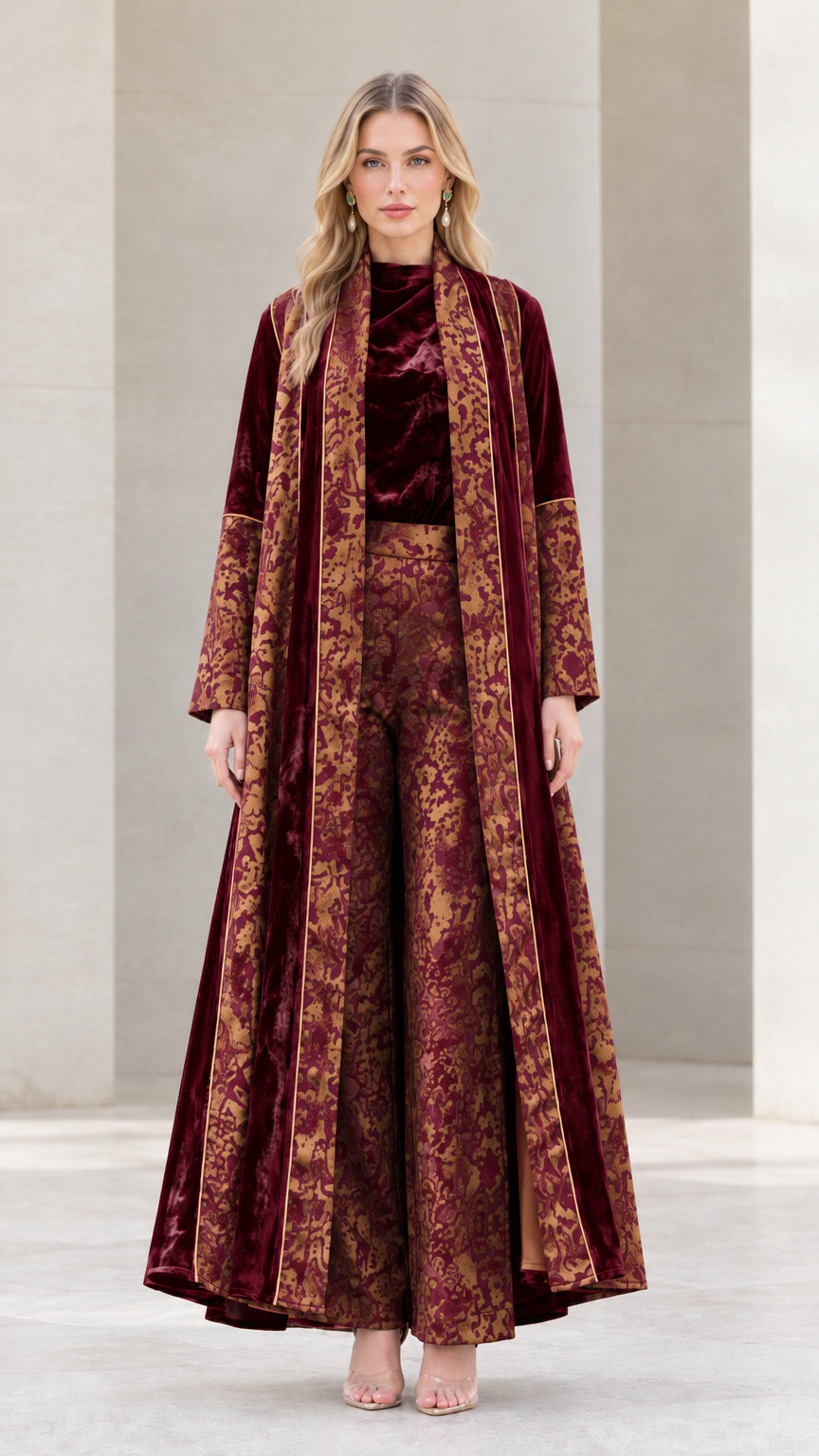 Model wearing Burgundy 3-piece velvet and jacquard maxi duster pant set