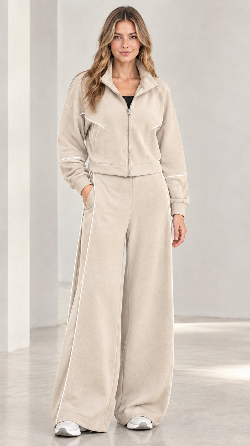 Front view of woman wearing beige contrast piping wide leg tracksuit set