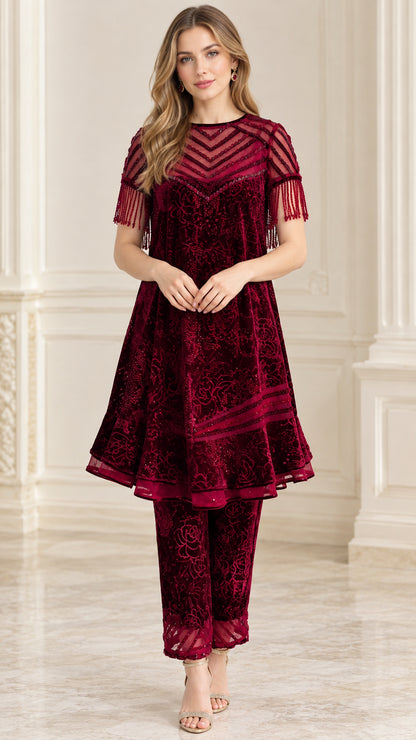 Front view of model wearing burgundy beaded sheer yoke velvet tunic and matching pants set