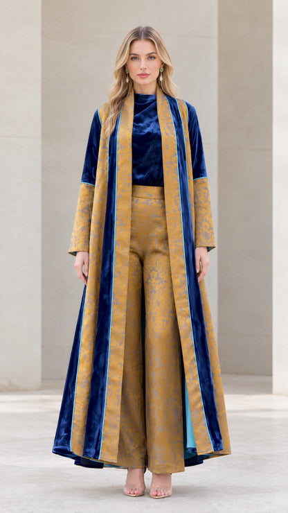 Front full-length view of model wearing Mustard and Royal Blue velvet jacquard 3-piece duster and pants set