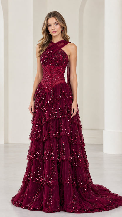 Front view of burgundy criss-cross halter sequin tiered evening gown