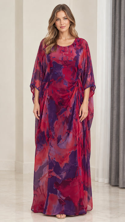 Front view of model wearing magenta purple floral watercolor draped kaftan maxi dress