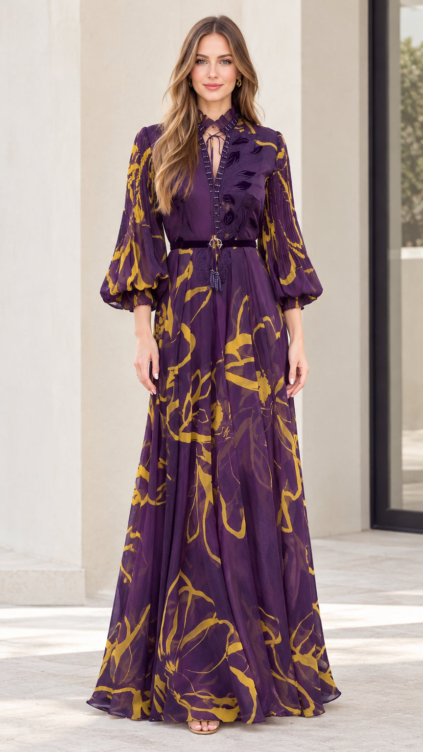 Front view of model wearing purple abstract floral print maxi dress with lantern sleeves and belt