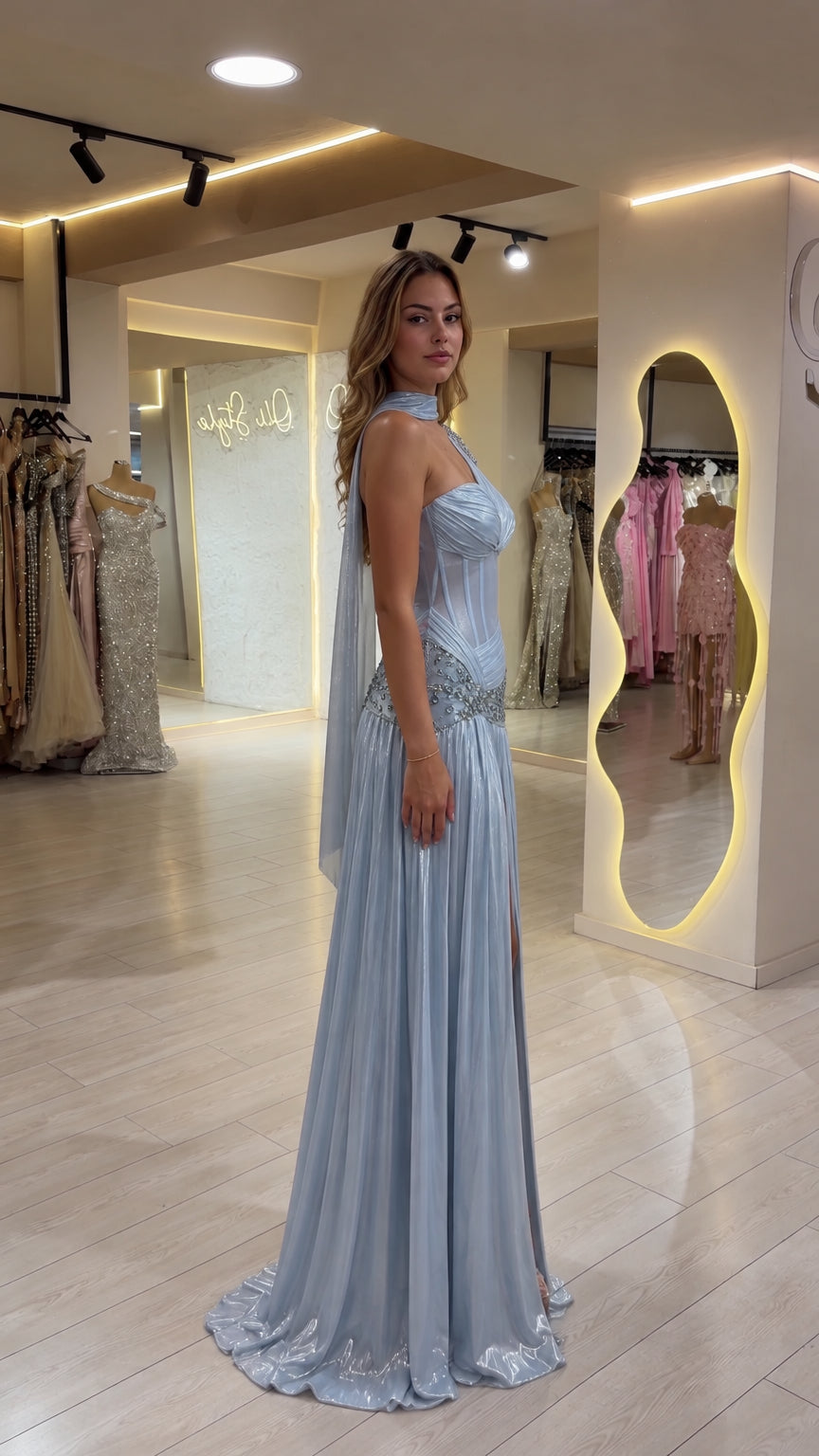 Side profile view of woman wearing Ice Blue metallic shimmer formal gown