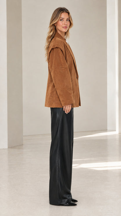 Side profile of camel oversized faux suede blazer showing length and shoulder flap detail