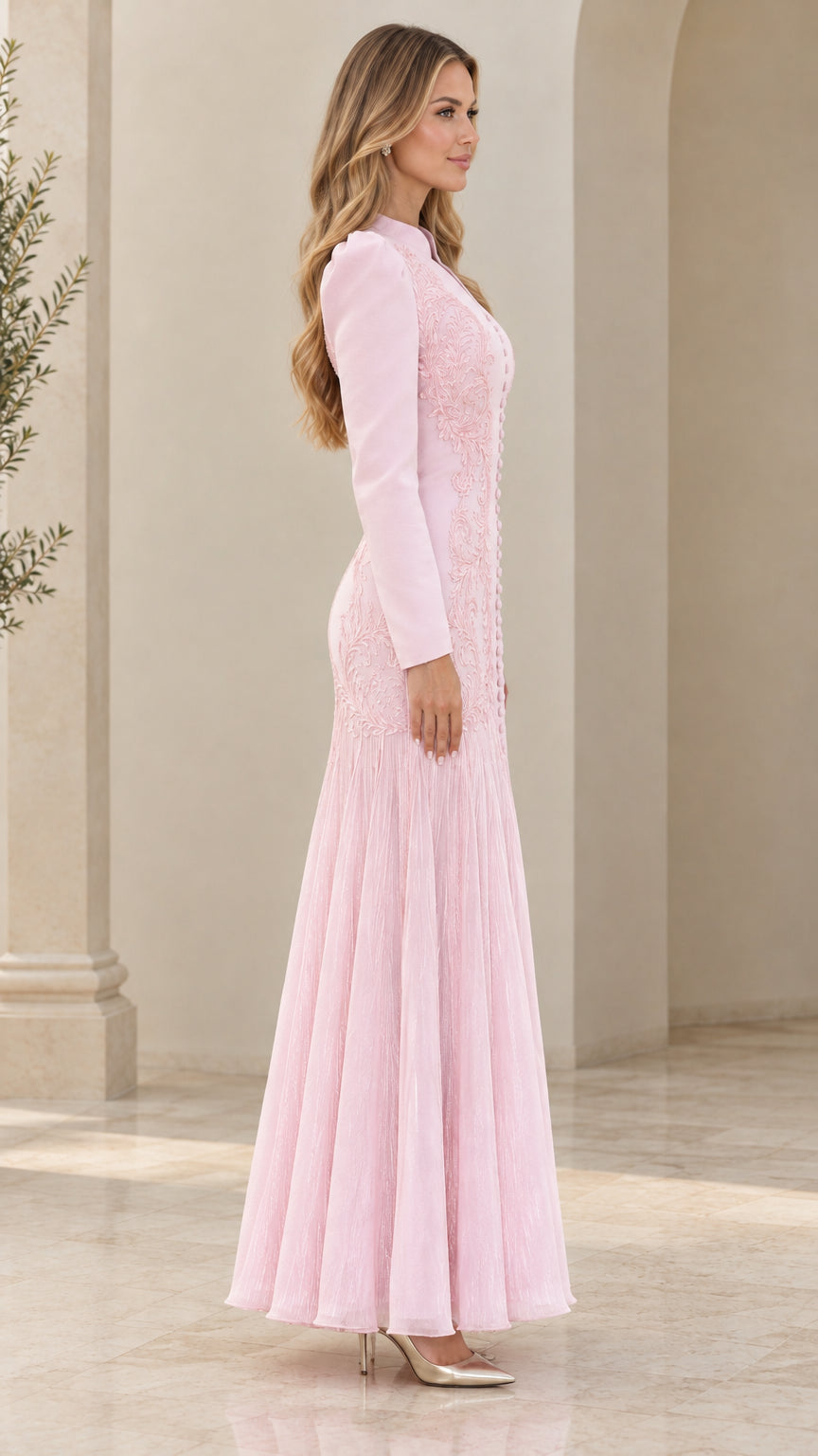 Side profile view of light pink long sleeve pleated maxi dress