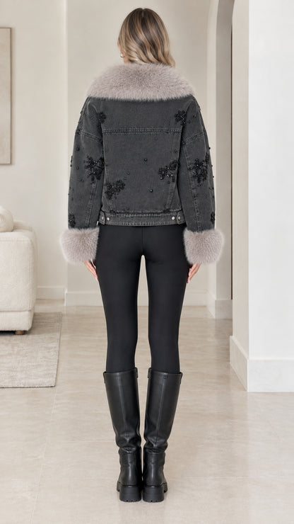 Back view of model wearing Washed Black beaded denim jacket