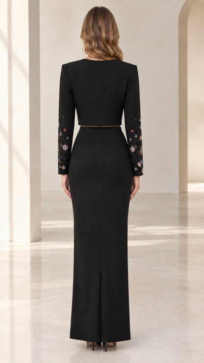Back view of black column evening gown set with long sleeves