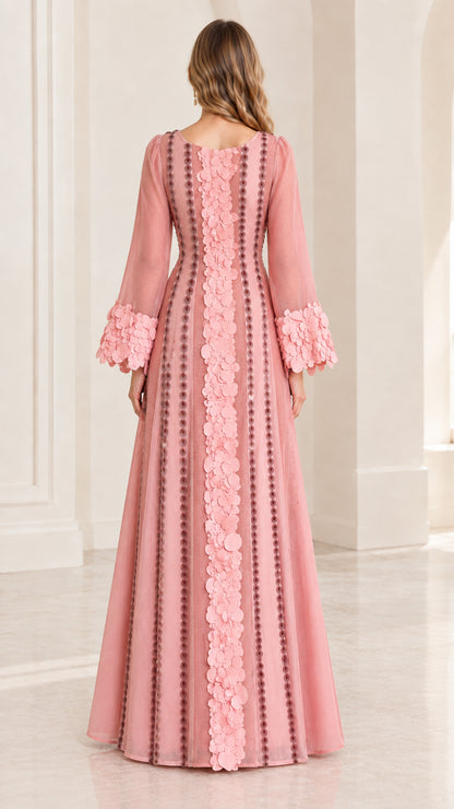 Back full-length view of dusty pink gown with linear bead trim details