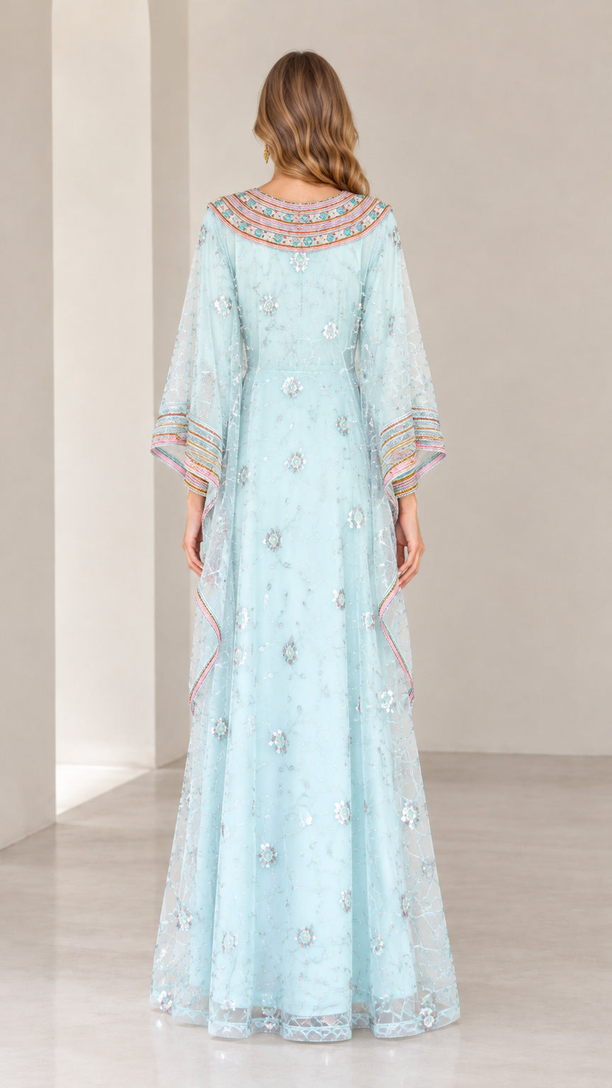 Back view of woman wearing Light Blue embroidered evening kaftan gown