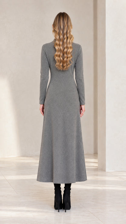 Back view of model in Heather Grey knit maxi dress showcasing the tailored fit