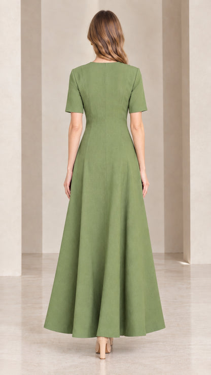 Back view of woman wearing sage green short sleeve maxi dress