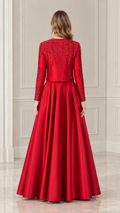 Back view of red beaded jacket and floor-length satin skirt