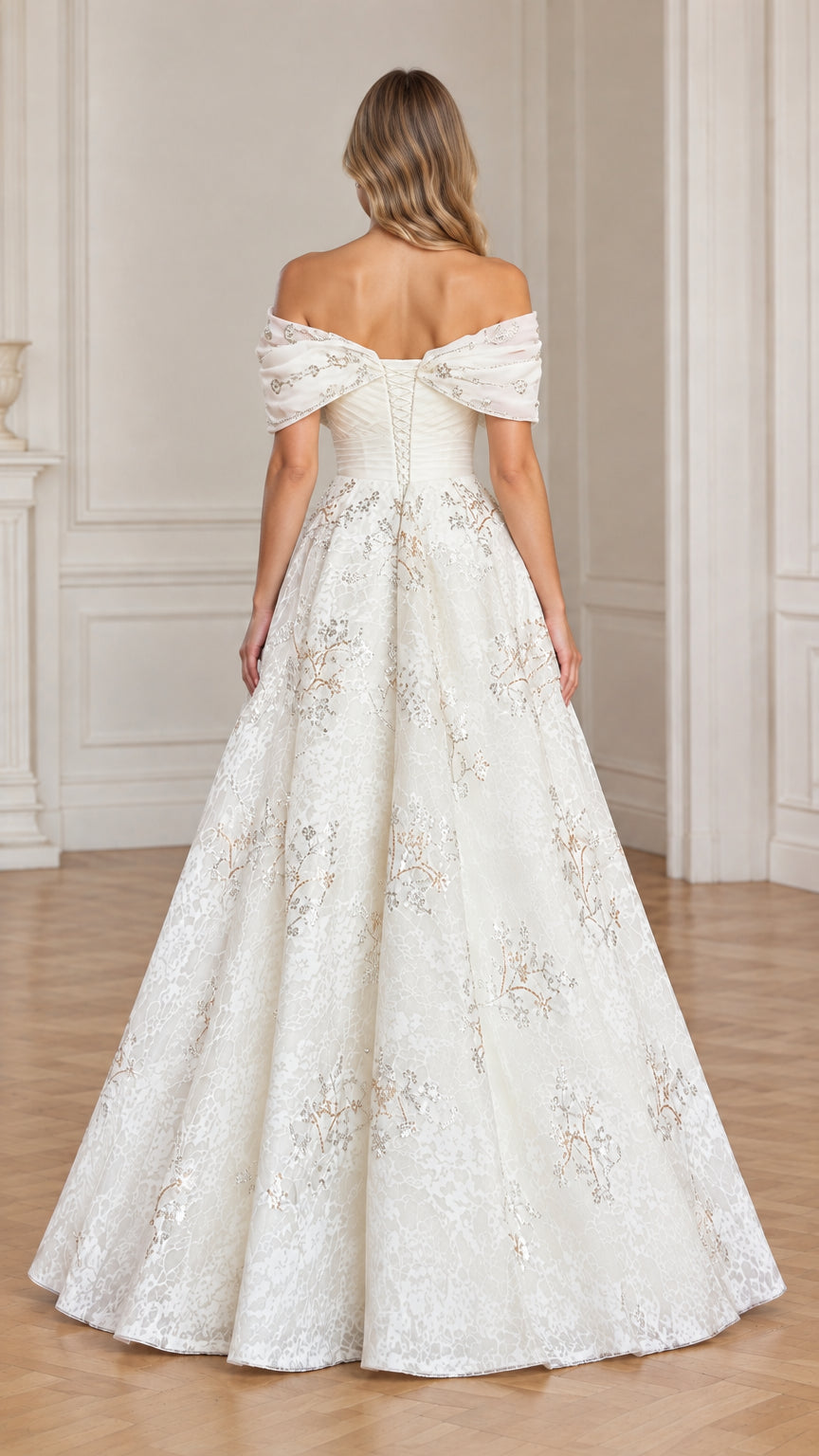 Back view of model showcasing ivory off-the-shoulder evening ball gown