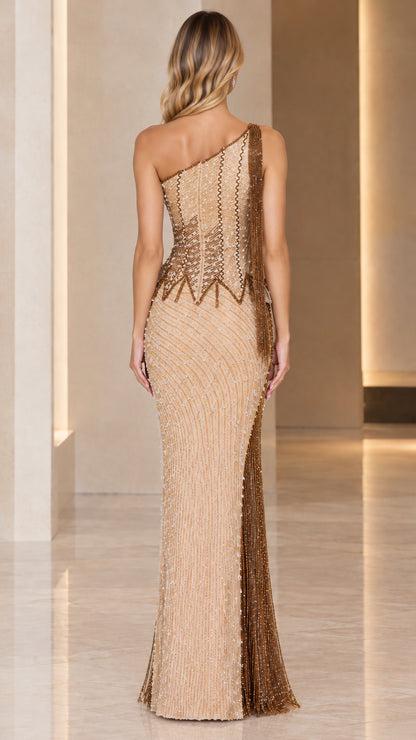 Back view of champagne gold one-shoulder embellished evening gown