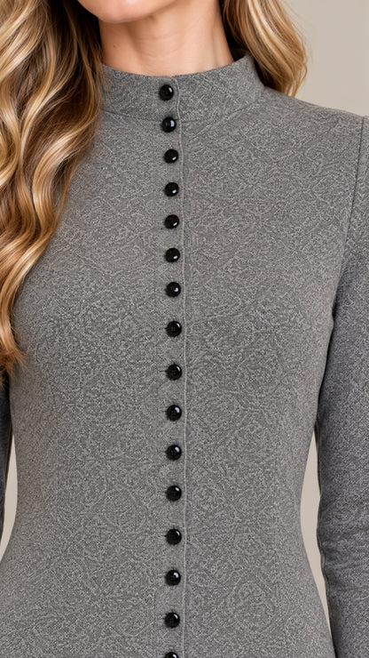 Close-up detail of Heather Grey textured knit fabric, mock neck collar, and black front buttons