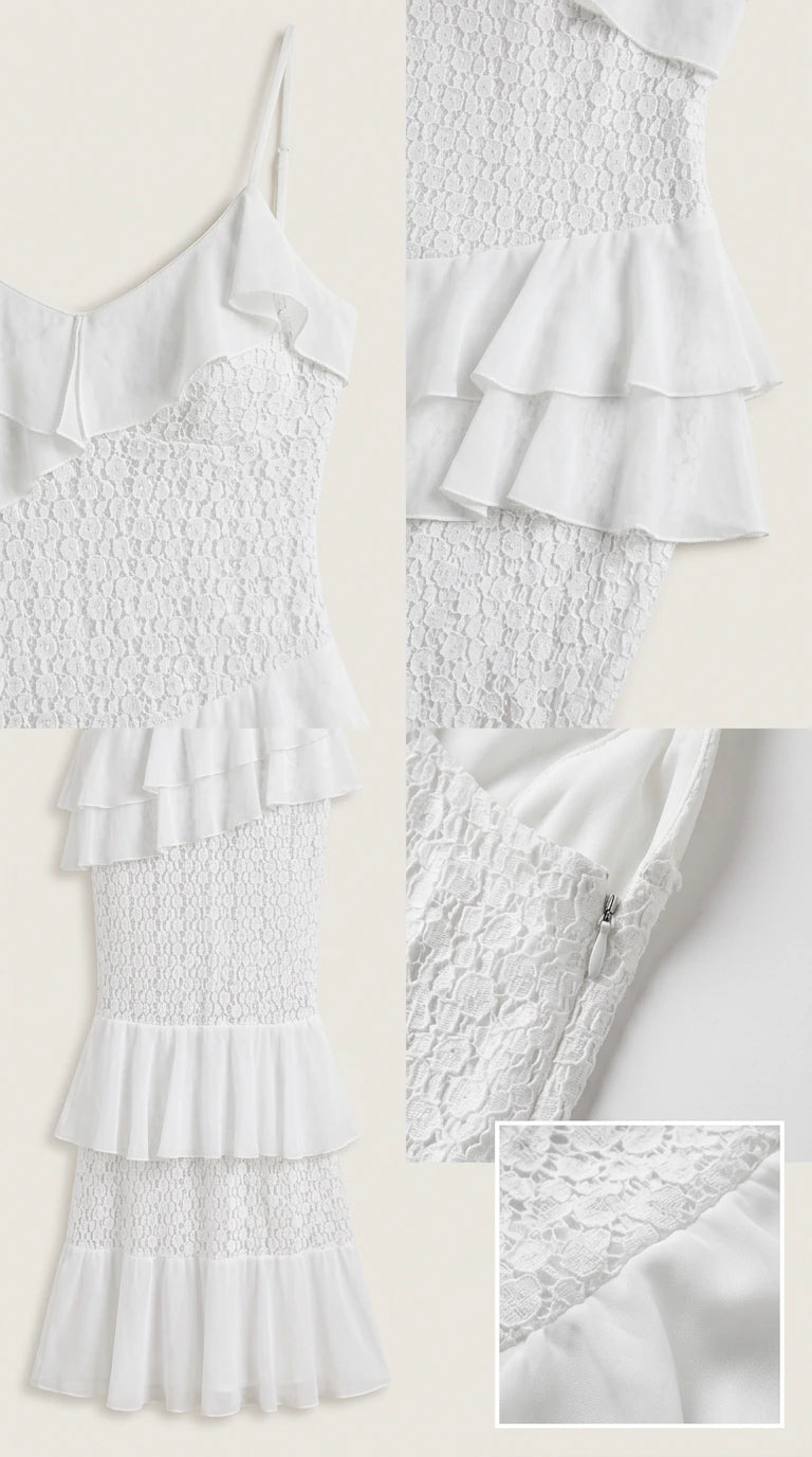 Detailed flat lay of white lace dress fabric, ruffles, and zipper closure