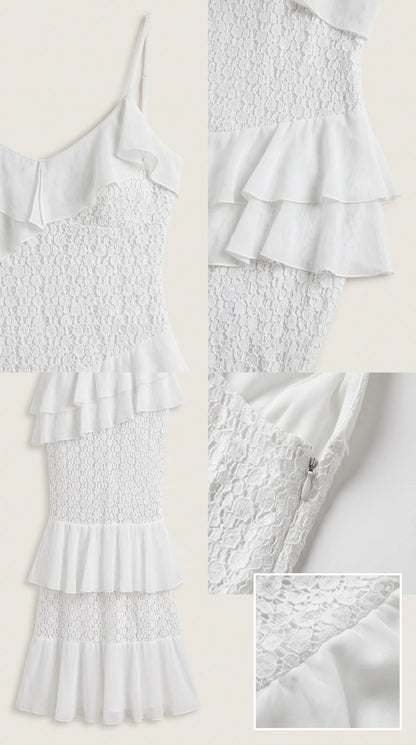 Detailed flat lay of white lace dress fabric, ruffles, and zipper closure