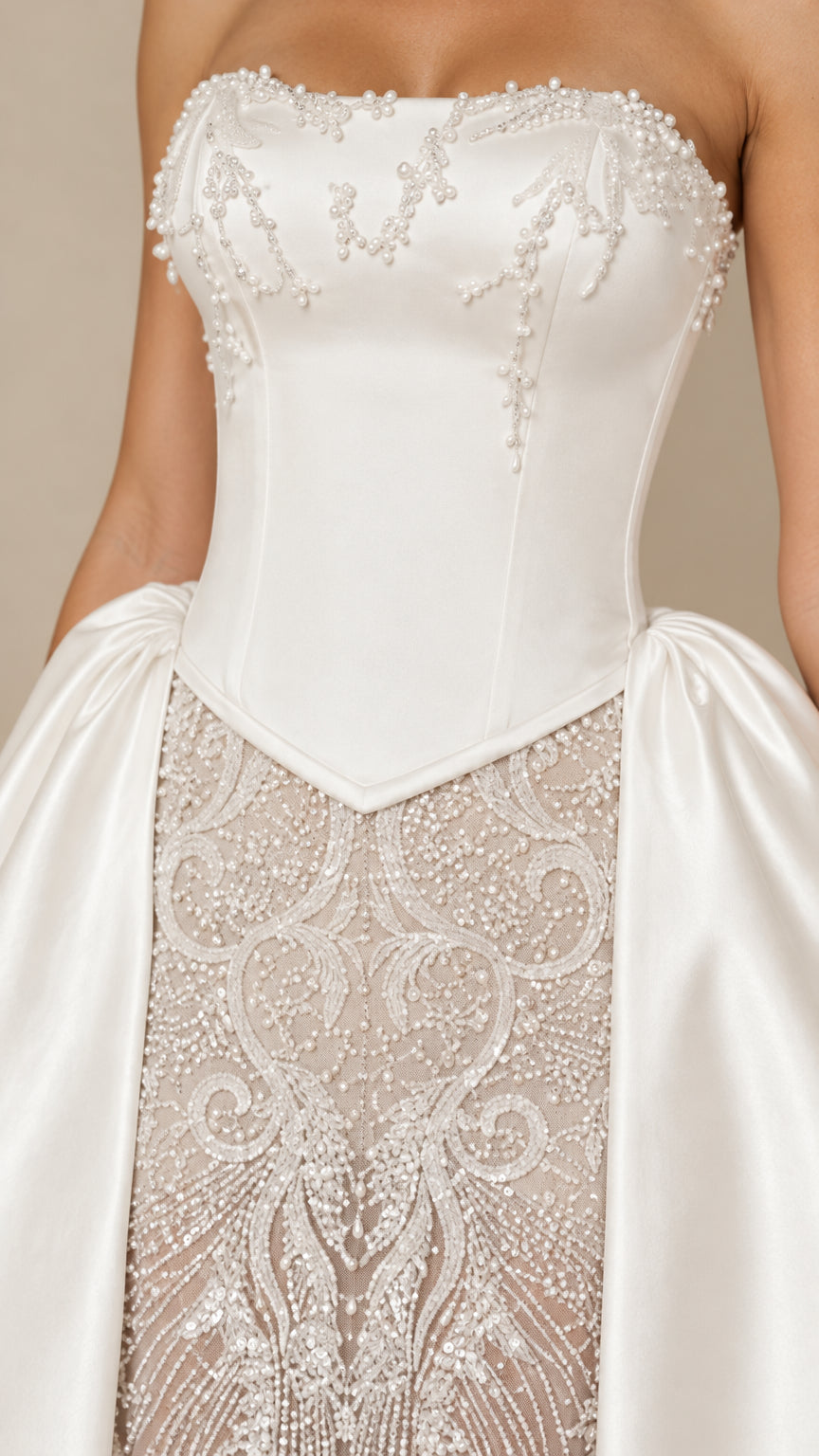 Close-up detail of beaded pearl corset bodice and embroidery on Ivory White gown