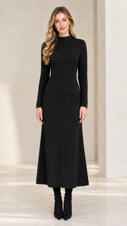 Model wearing Black mock neck long sleeve button down maxi dress