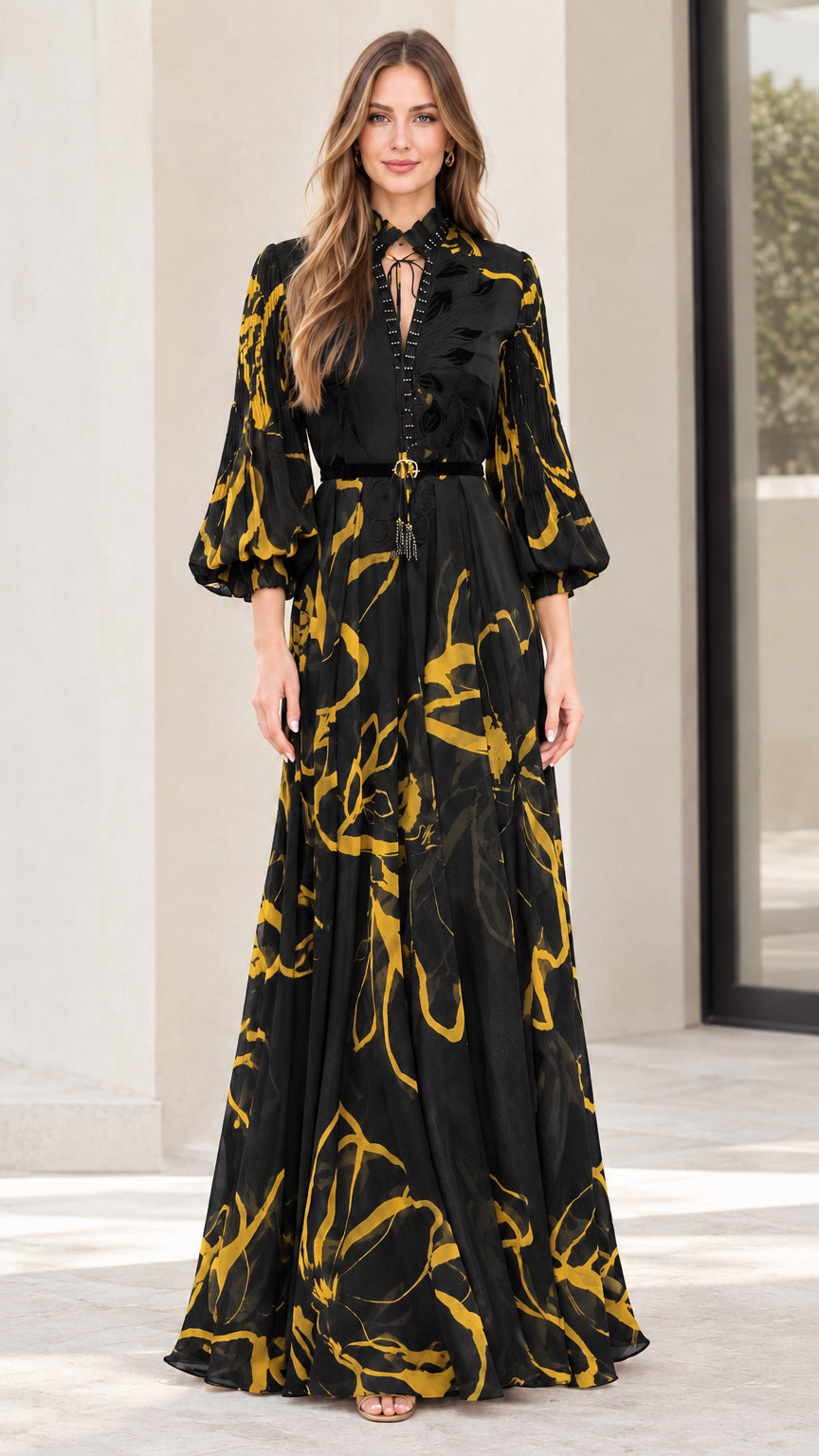 Model wearing black abstract print lantern sleeve belted maxi dress