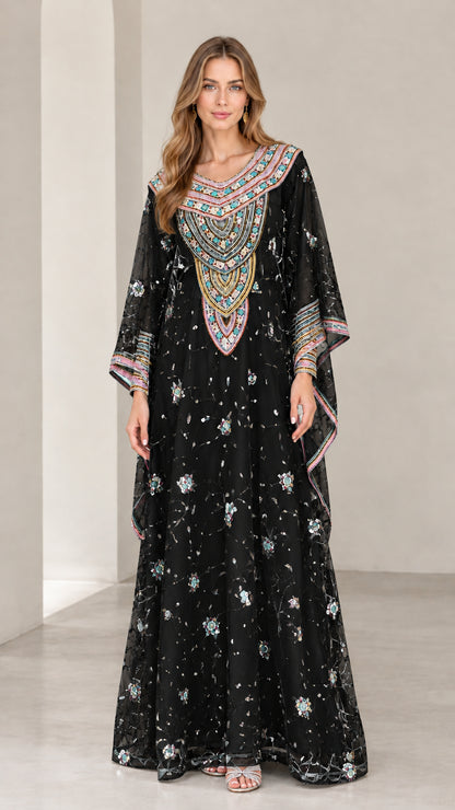 Full-length view of woman wearing Black embroidered kaftan maxi dress