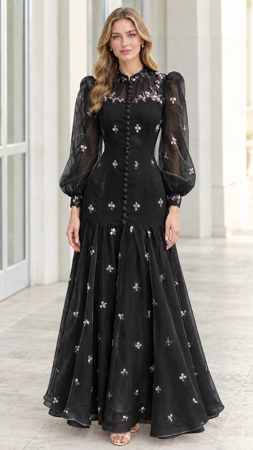 Front view of black long sleeve floral embroidered evening maxi gown