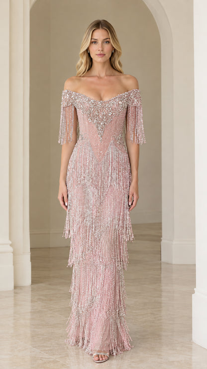 Full-length view of woman wearing blush pink off-the-shoulder beaded fringe formal dress