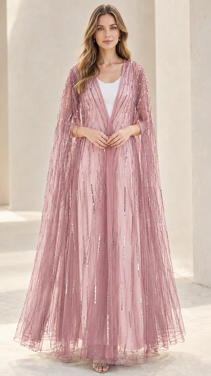 Blush pink sequin floor-length evening cape over dress