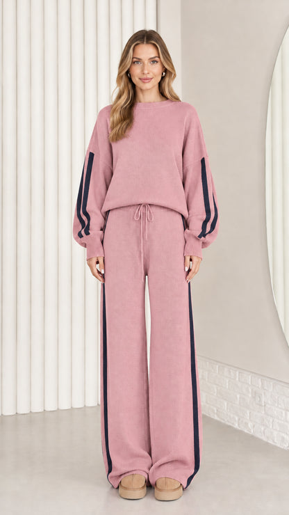 Front view of model wearing dusty pink knit two-piece lounge set with navy stripes