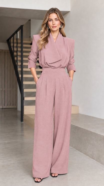 Front full view of woman wearing dusty pink tailored wrap-front wide-leg jumpsuit