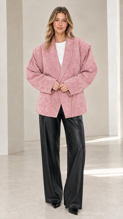 Front view of model wearing dusty pink faux suede oversized tailored blazer