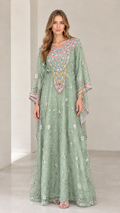 Full-length view of woman wearing Sage Green embroidered kaftan maxi dress