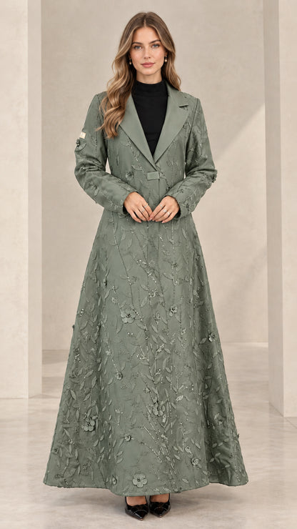 Front view of woman wearing sage green floral sequin maxi evening coat