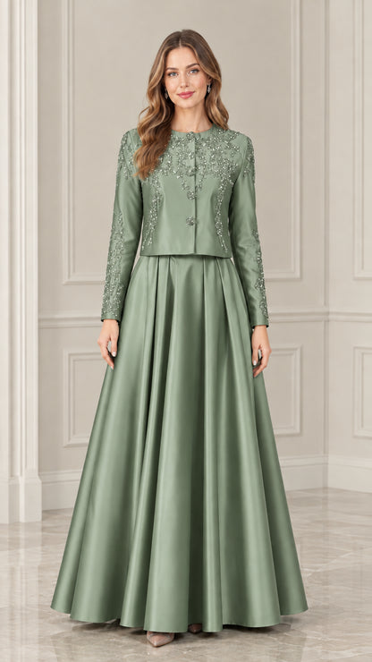Model wearing sage green beaded jacket and pleated satin maxi skirt set