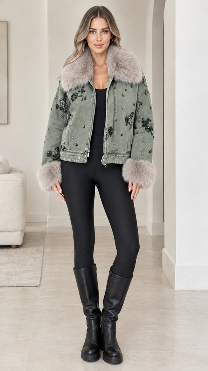 Front view of model wearing Sage Green beaded denim jacket with fur cuffs