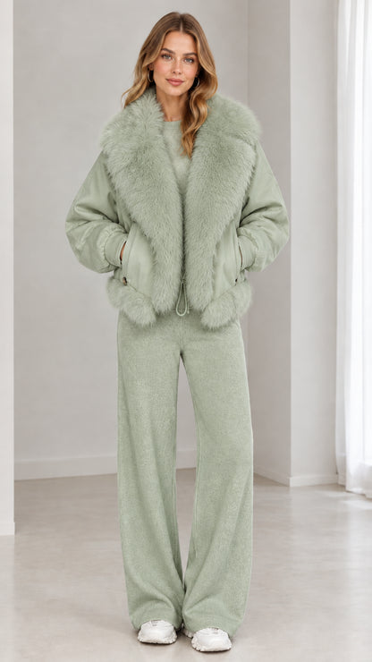 Full front view of model wearing sage green faux-fur collar zip-up jacket and matching sage pants