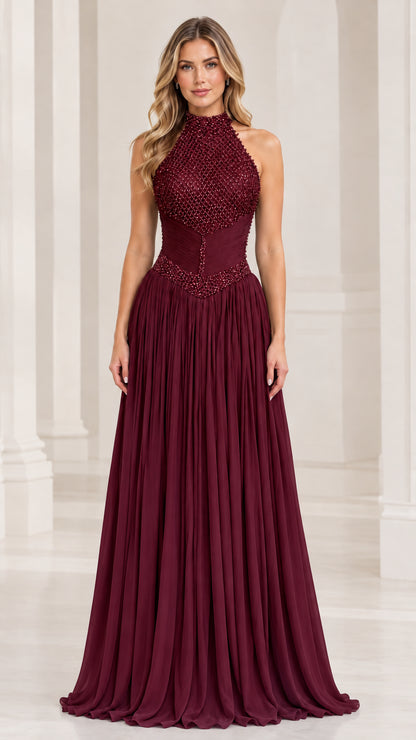 Front view of model wearing a burgundy wine high-neck halter beaded formal gown