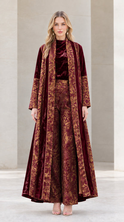 Model wearing Burgundy 3-piece velvet and jacquard maxi duster pant set