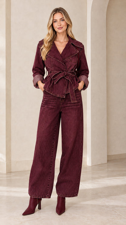 Model wearing Burgundy belted denim jacket and wide-leg pants set