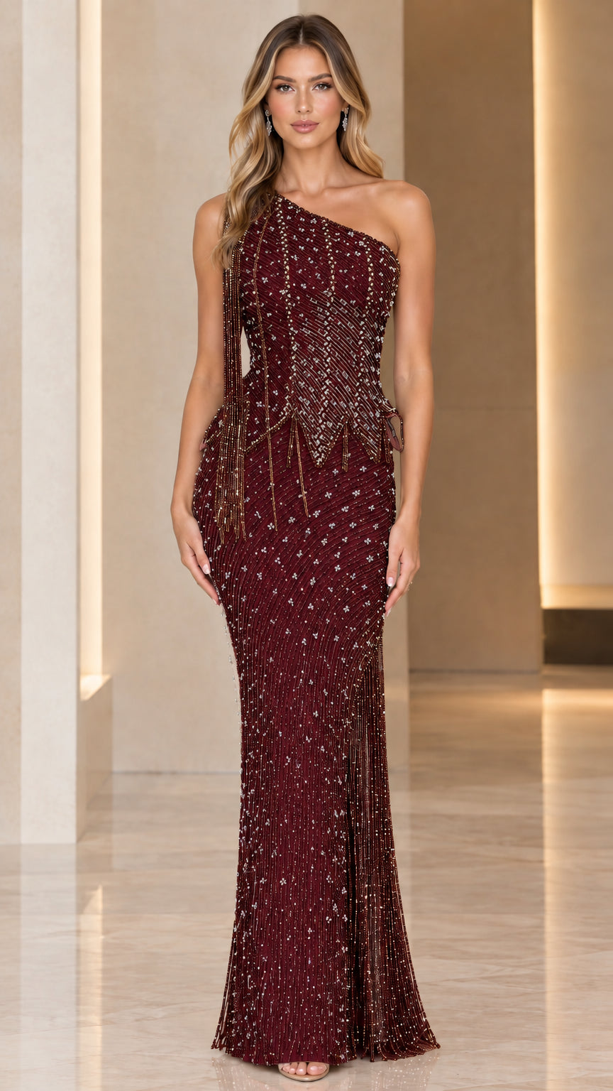 Burgundy one-shoulder beaded mermaid dress with fringe embellishment