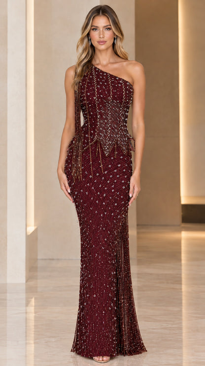 Burgundy one-shoulder beaded mermaid dress with fringe embellishment