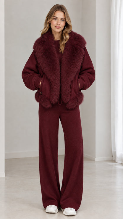 Full front view of model wearing burgundy faux-fur collar zip-up jacket and matching burgundy pants